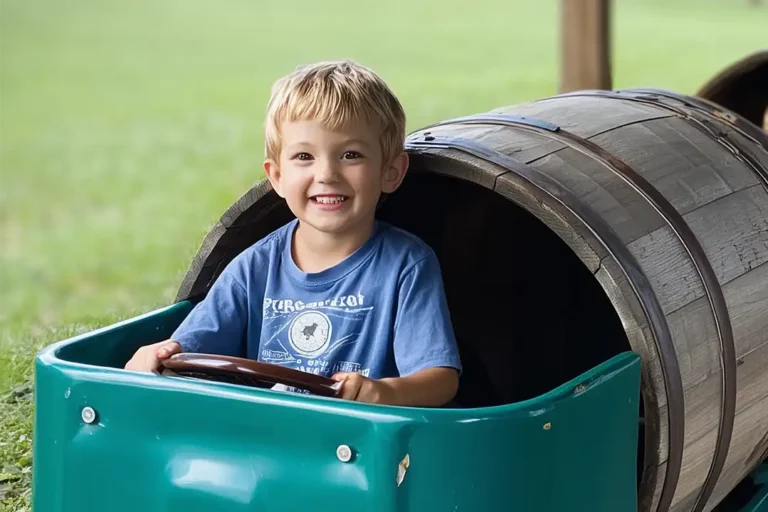Summer Adventures 8 A happy young boy rides the barrel train at lillingstone pick your own