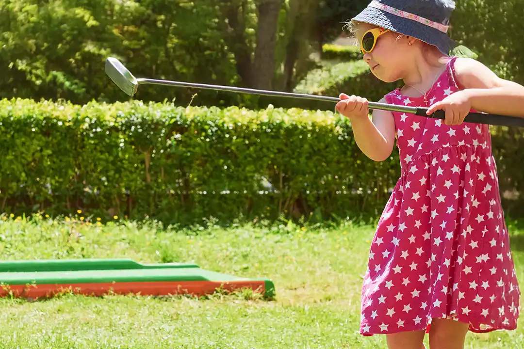 Summer Adventures 6 Young girl plays mini golf at lillingstone pick your own