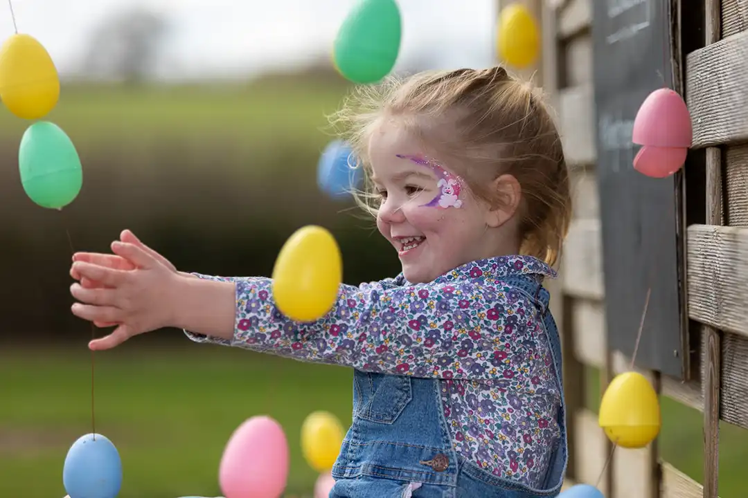 A young girl enjoys easter celebrations at Lillingstone Pick Your Own Farm