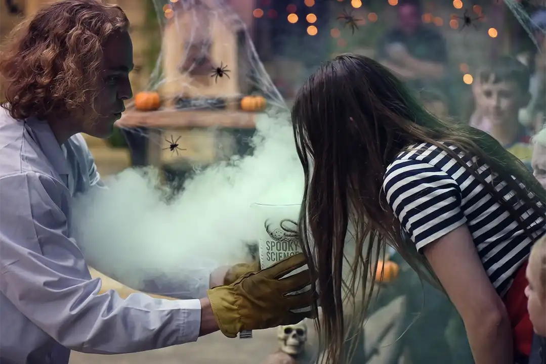Einstein's Entertainers put on a spooky show with a bubbling flask with green mist
